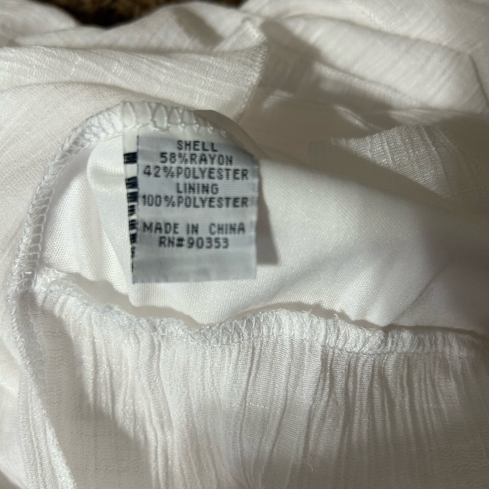 Elegant White Smocked Maxi Dress - Picture 9 of 10